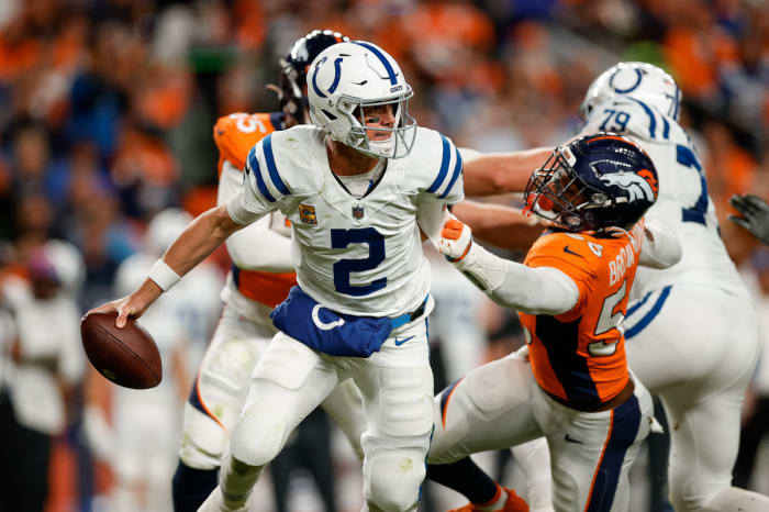 Oct 6, 2022; Denver, Colorado, USA; Denver Broncos cornerback Pat Surtain II (2) scrambles under pressure from Denver Broncos linebacker Baron Browning (56) in the second quarter at Empower Field at Mile High. Mandatory Credit: Isaiah J. Downing-USA TODAY Sports